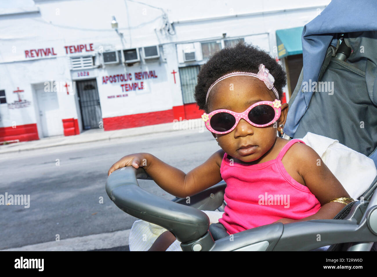 Miami Florida,Overtown,Black Blacks African Africans ethnic minority,girl girls,youngster youngsters youth youths female kid kids child children,baby Stock Photo