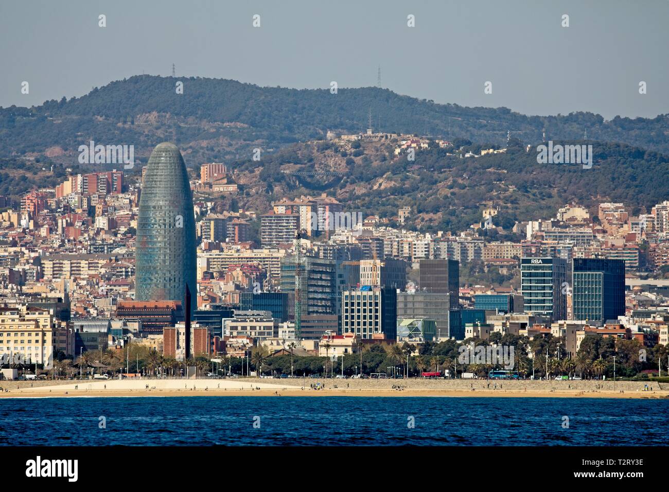Barcelona skyline from the sea Stock Photo