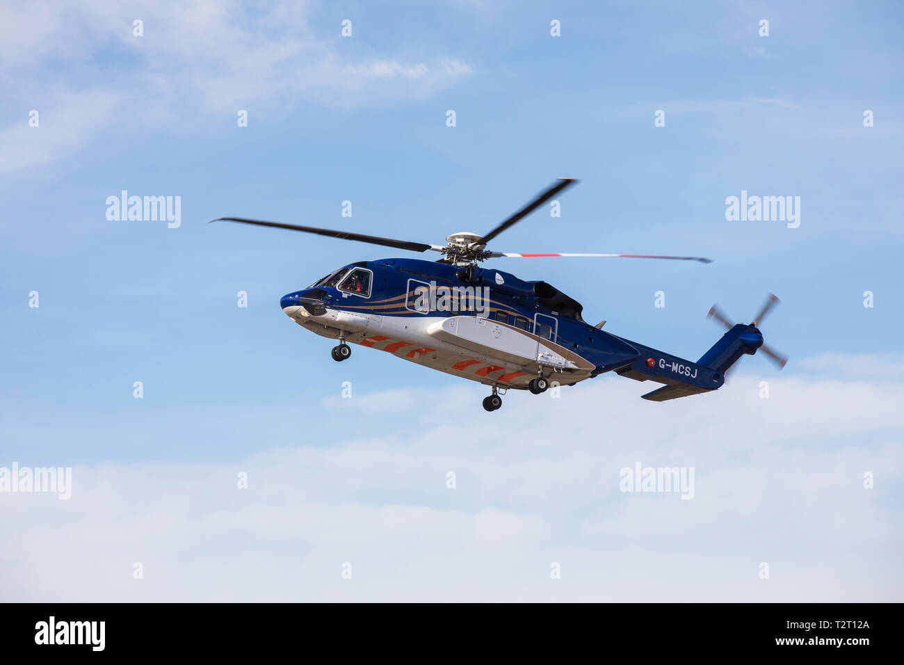 A Babcock Sikorsky S-92 helicopter used to transport oil workers to and from the rigs in the North Sea, pictured at Aberdeen Airport, Scotland, UK. Stock Photo