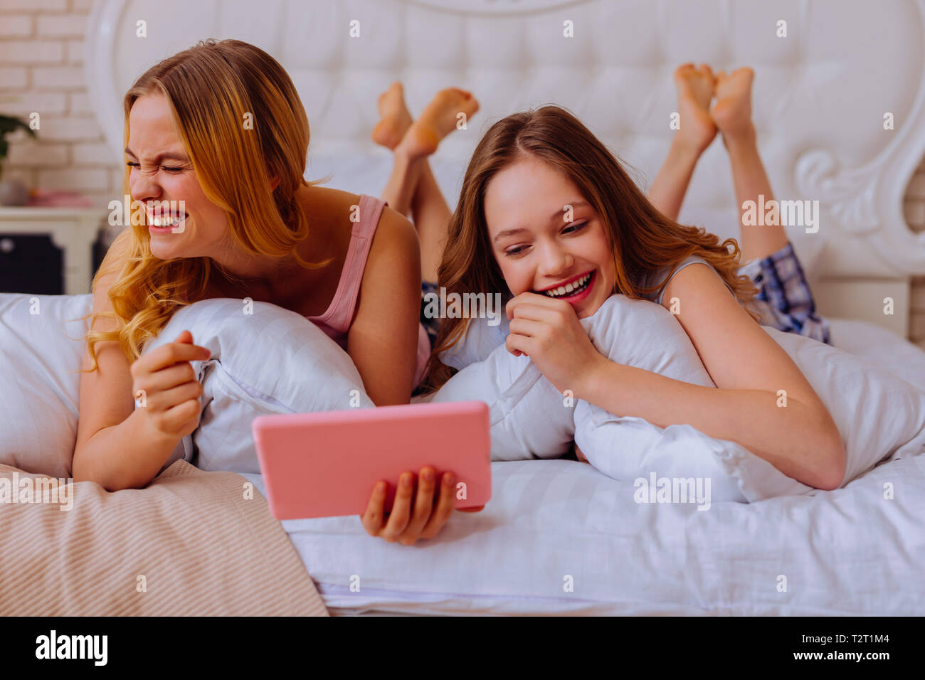Sisters Laughing Older Blonde Haired Sisters Laughing Out Loud