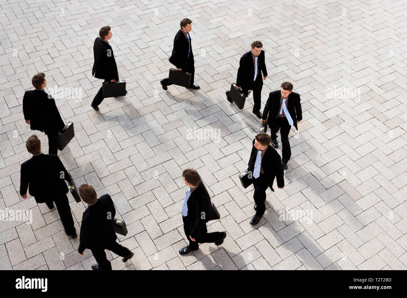 Top view of a caucasian businessman walking round in circles Stock