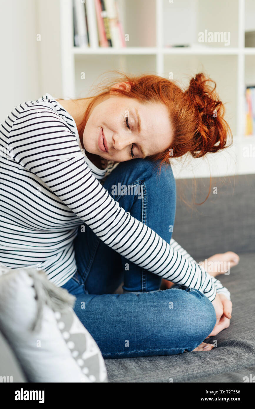 Resting head on knee hires stock photography and images Alamy