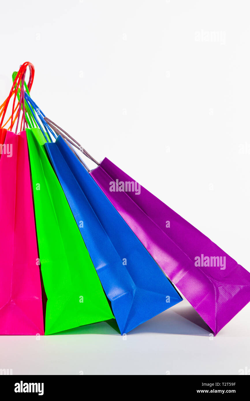 Set of colorful empty shopping bags isolated on the white background ...