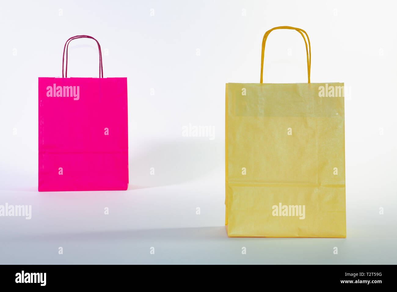 Set of colorful empty shopping bags isolated on the white background ...