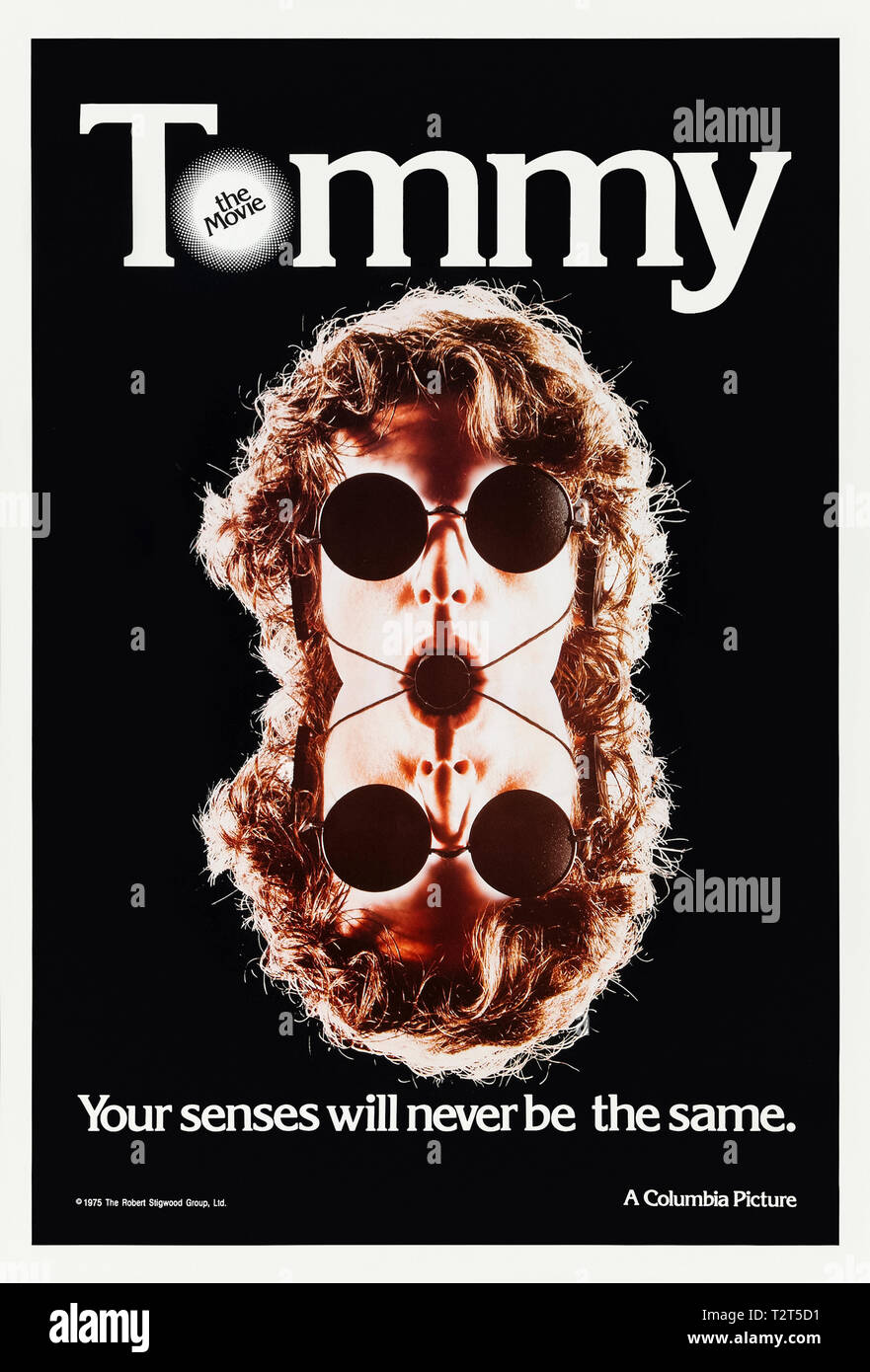 Tommy (1975) directed by Ken Russell and starring Roger Daltrey, Ann-Margret, Oliver Reed, Elton John, Eric Clapton, Keith Moon, Jack Nicholson and Pete Townshend. Tommy is struck deaf, dumb and blind and becomes a pinball legend when playing through intuition. Stock Photo