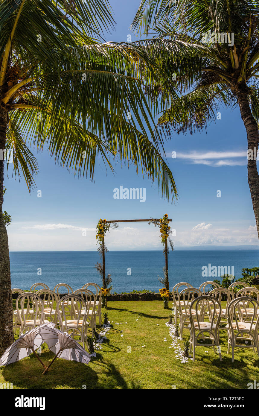 Wedding Arch For A Ceremony Decorated With Tropical Flowers And White wedding-arch-for-a-ceremony-decorated-with-tropical-flowers-and-white