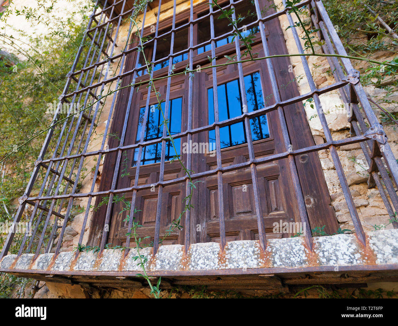 Time-Worn Window and Security Bars, Alhambra Stock Photo