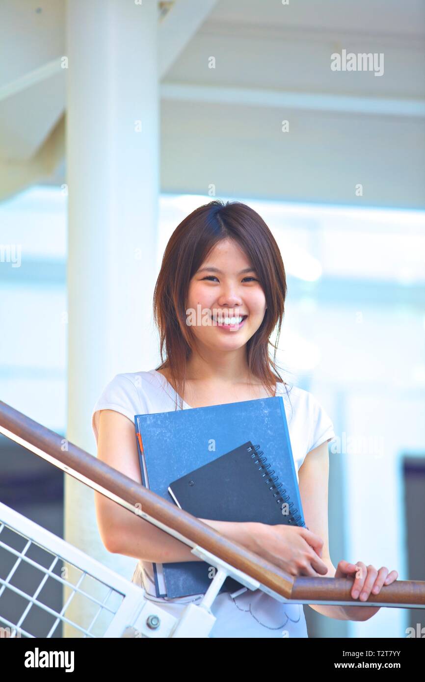 Asian Female Student Studying Stock Photo