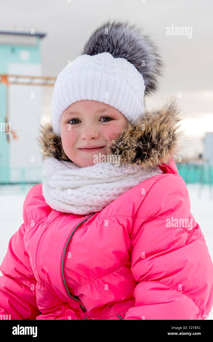 Outdoor portrait of little girl in winter clothes Stock Photo - Alamy
