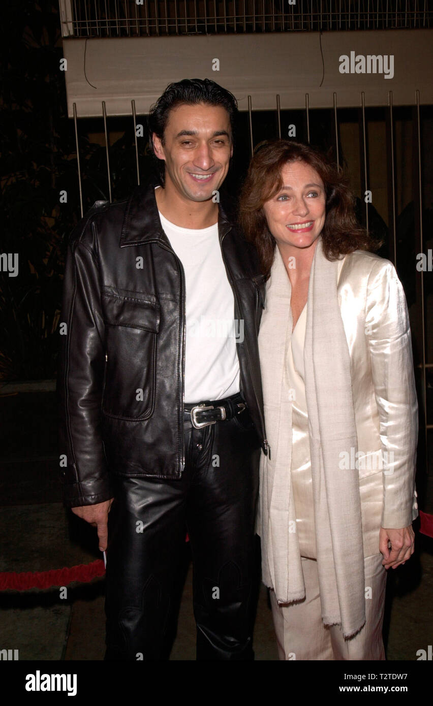 LOS ANGELES, CA. October 16, 2000: Actress JACQUELINE BISSET & boyfriend EMIN BOZTEPE at the Los Angeles premiere, in Hollywood, of Requiem For A Dream. © Paul Smith / Featureflash Stock Photo