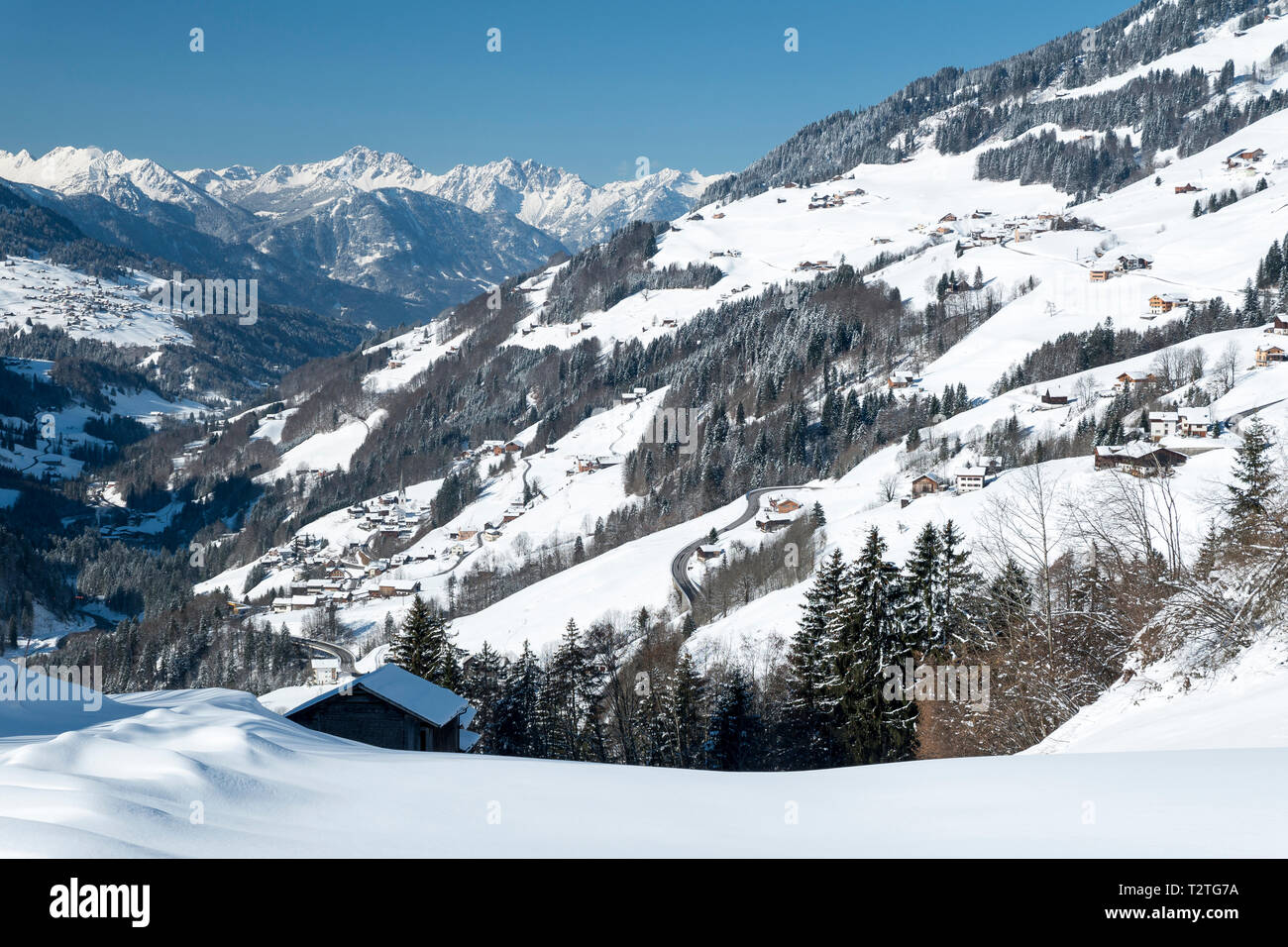 Austria, Biosphere Park Grosses Walsertal,  Fontanella and Sonntag villages and the valley covered with snow Stock Photo