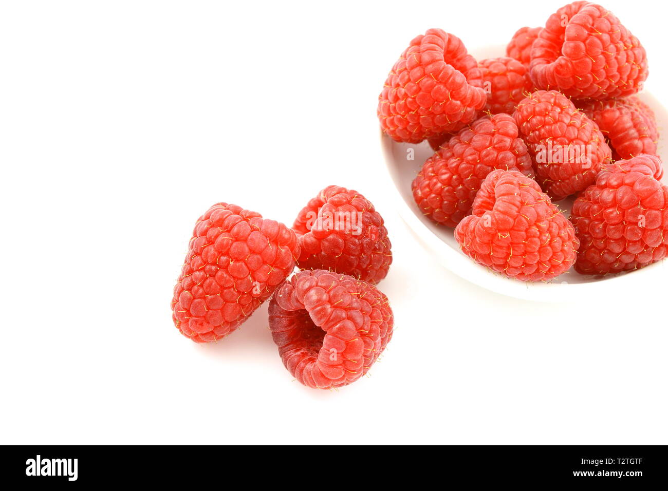 Small Rasperry Fruit fresh red raspberry fruits in a small white bowl Stock Photo - Alamy