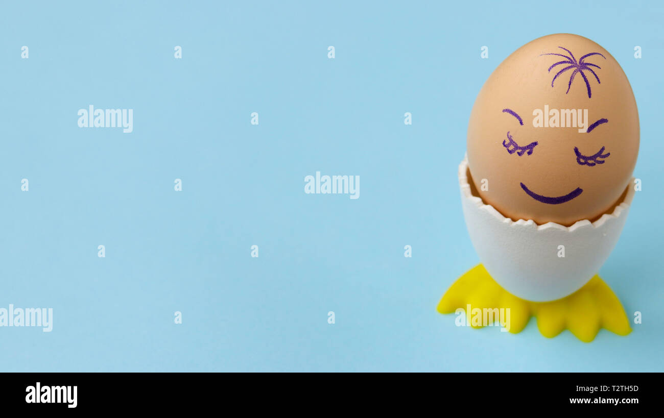 White chicken egg sleeping with happy face on the blue background, Copy ...