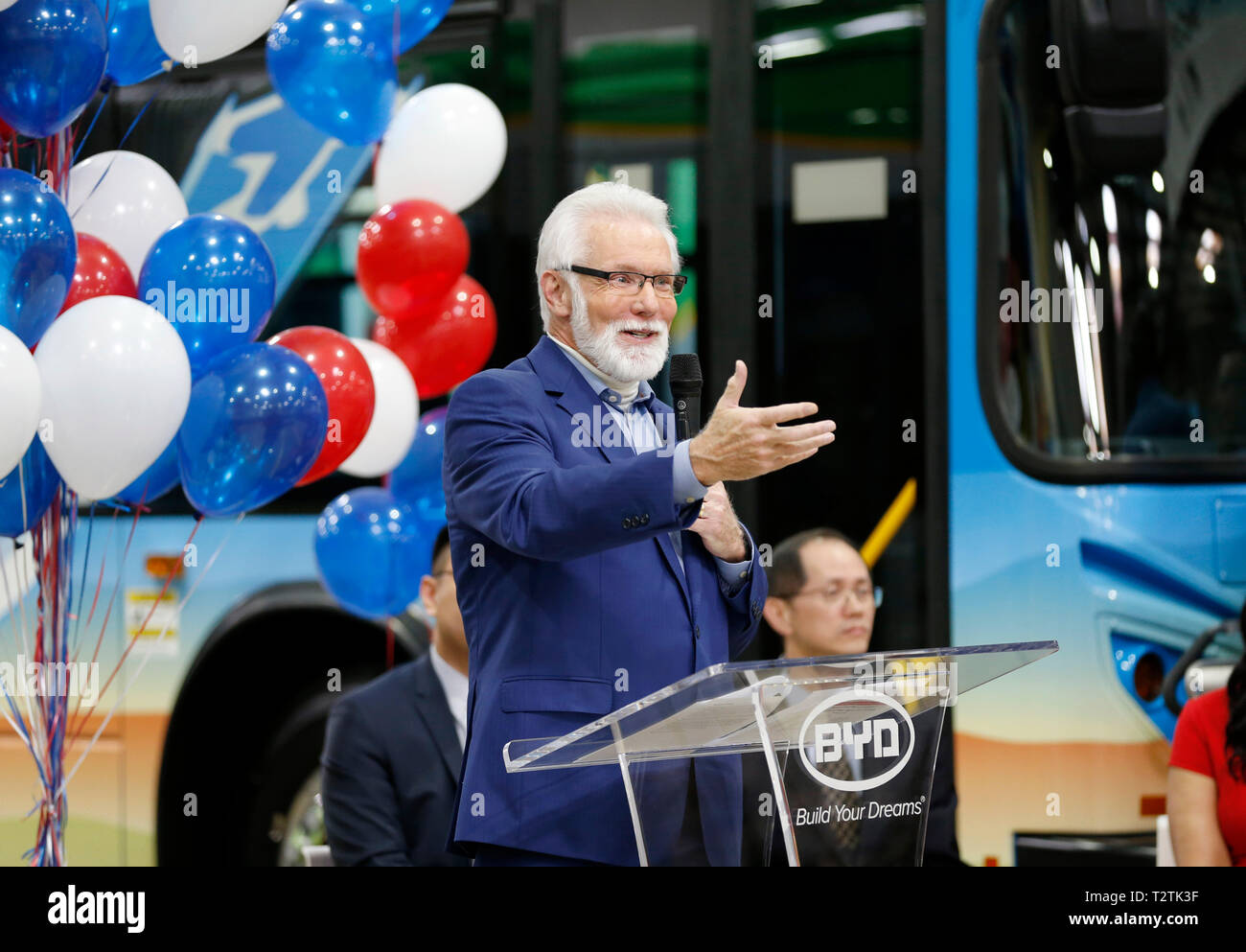 (190404) -- LANCASTER, April 4, 2019 (Xinhua) -- Lancaster Mayor R. Rex Parris delivers a speech at the 300th BYD electric bus offline ceremony in Lancaster, Los Angeles County, the United States, April 3, 2019. China's leading electric vehicle maker BYD said on Wednesday that it has rolled out the 300th bus at its Lancaster manufacturing plant in the U.S. state of California, marking a milestone for production. The 300th bus, a 35-foot BYD K9S model transit bus, is one of three built for the Capital Area Transit System of Baton Rouge, capital of the U.S. state of Louisiana, the company sa Stock Photo