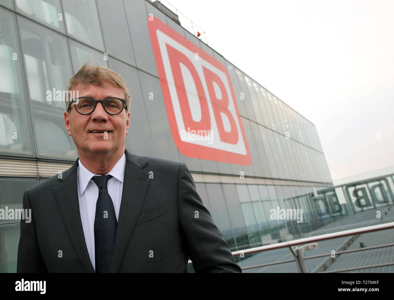 Berlin, Germany. 03rd Apr, 2019. Ronald Pofalla, Chief Infrastructure Officer of Deutsche Bahn, stands on the terrace of the Bahntower. Deutsche Bahn wants more money from the federal government to renew its rail network. According to current plans, the federal government intends to increase the funds for this from 3.5 billion euros at present to 4.5 billion euros per year. Credit: Wolfgang Kumm/dpa/Alamy Live News Stock Photo