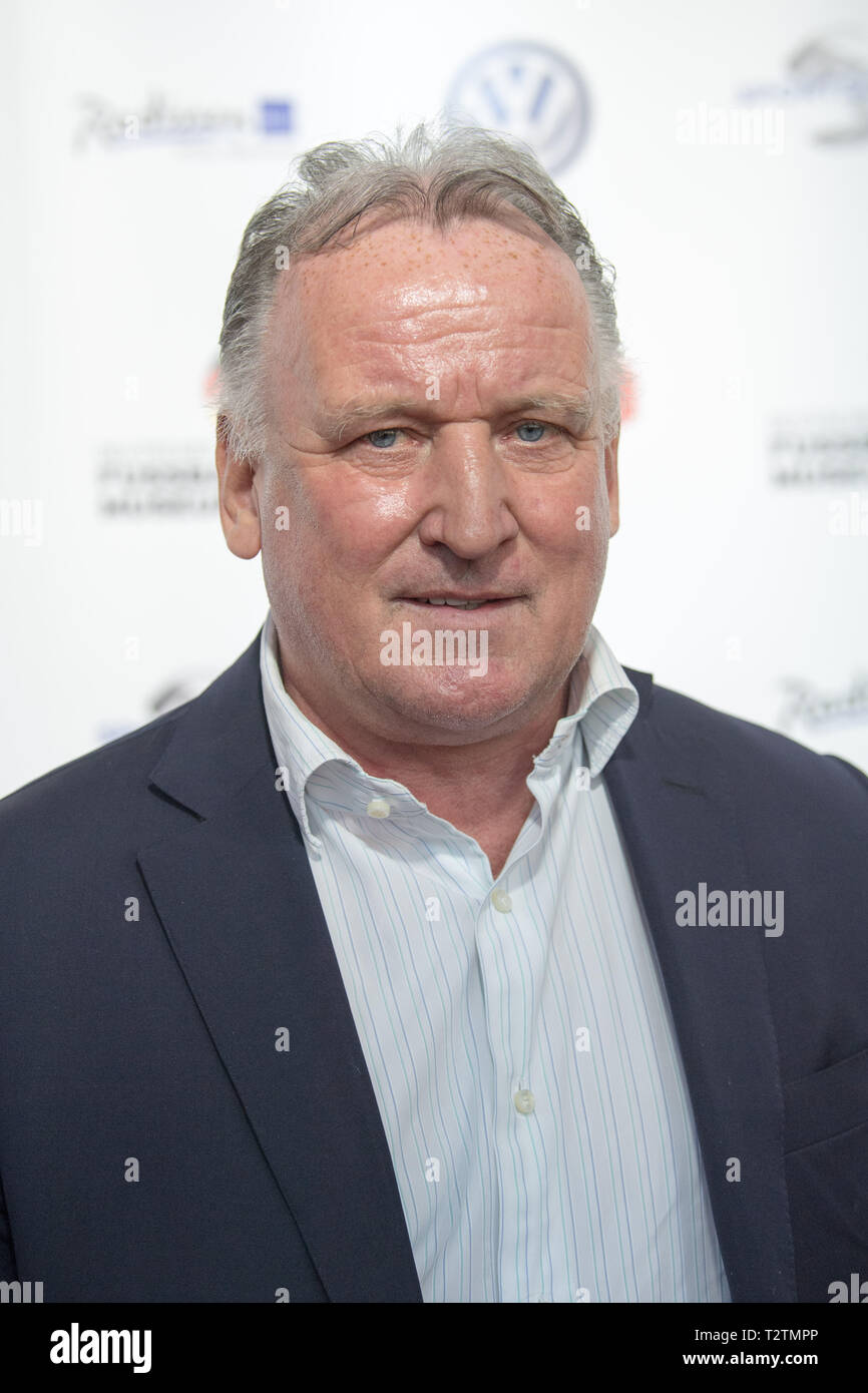 Dortmund, Deutschland. 01st Apr, 2019. Andreas BREHME, former professional  football player, half-length portrait, portrait format, red carpet before  the award ceremony for the opening of the Hall of Fame of the German