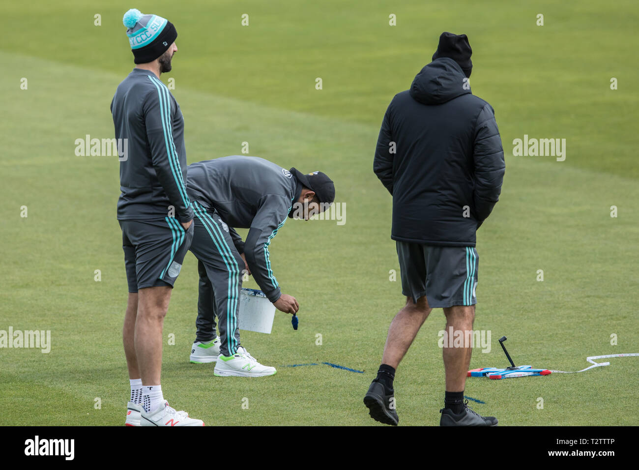 London, UK. 4th Apr, 2019. Ryan Patel paints his bowling marks ahead of the days play as Surrey take on Durham MCCU at the Kia Oval on day one of the 3 day match. Credit: David Rowe/Alamy Live News Stock Photo