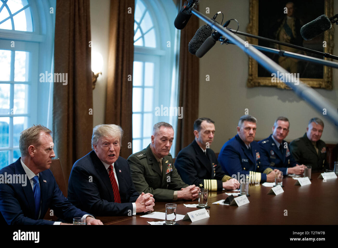 US President Donald J. Trump (L-2), with Acting Secretary of Defense Patrick Shanahan (L) and Chairman of the Joint Chiefs of Staff General Joseph Dunford (L-3), delivers remarks during a briefing by senior military leaders in the Cabinet Room of the White House in Washington, DC, USA, 03 April 2019. Following the briefing President Trump will host a dinner for the officials. Credit: Shawn Thew/Pool via CNP /MediaPunch Stock Photo