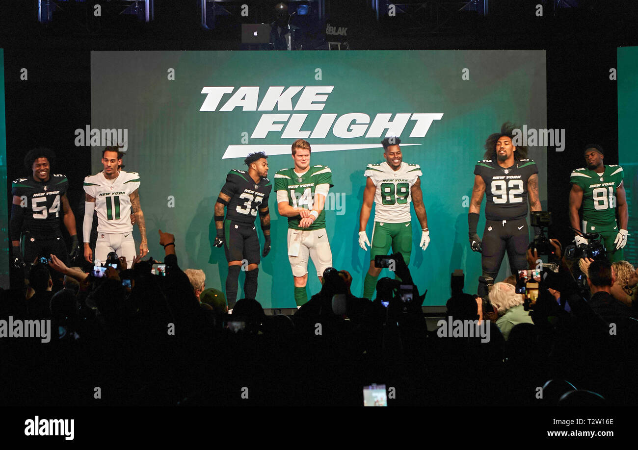 New York, New York, USA. 4th Apr, 2019. New York Jets inside linebacker Avery Williamson (54), wide receiver Robie Anderson (11), safety Jamal Adams (33), quarterback Sam Darnold (14), tight end Chris Herndon (89), defensive end Leonard Williams (92) and wide receiver Quincy Enunwa (81) unveil their new uniforms Thursday, April. 4, 2019, at Gotham Hall in New York City. The NFL Football team is scheduled to wear the uniforms during the regular season. Duncan Williams/CSM/Alamy Live News Stock Photo