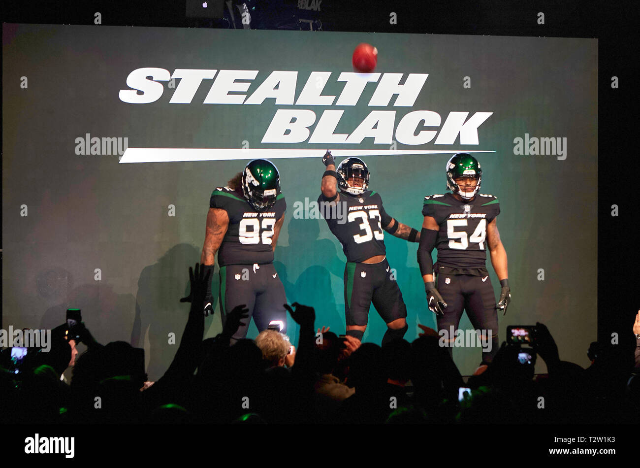 New York, New York, USA. 4th Apr, 2019. New York Jets safety Jamal Adams (33), defensive end Leonard Williams (92) and inside linebacker Avery Williamson (54) unveil Stealth Black color uniforms Thursday, April. 4, 2019, at Gotham Hall in New York City. The NFL Football team is scheduled to wear the uniforms during the regular season. Duncan Williams/CSM/Alamy Live News Stock Photo