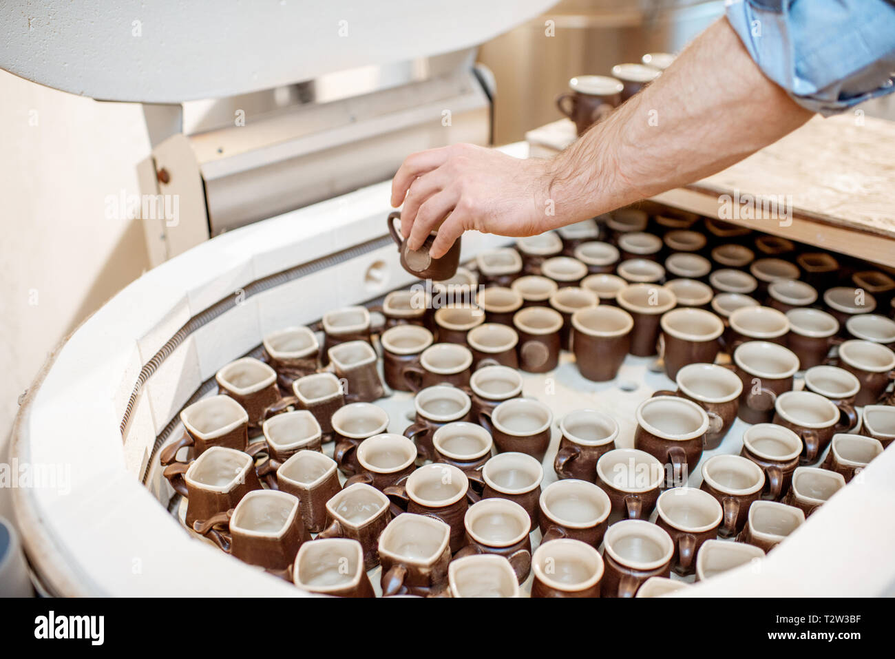Ceramic cups kiln oven potter hires stock photography and images Alamy