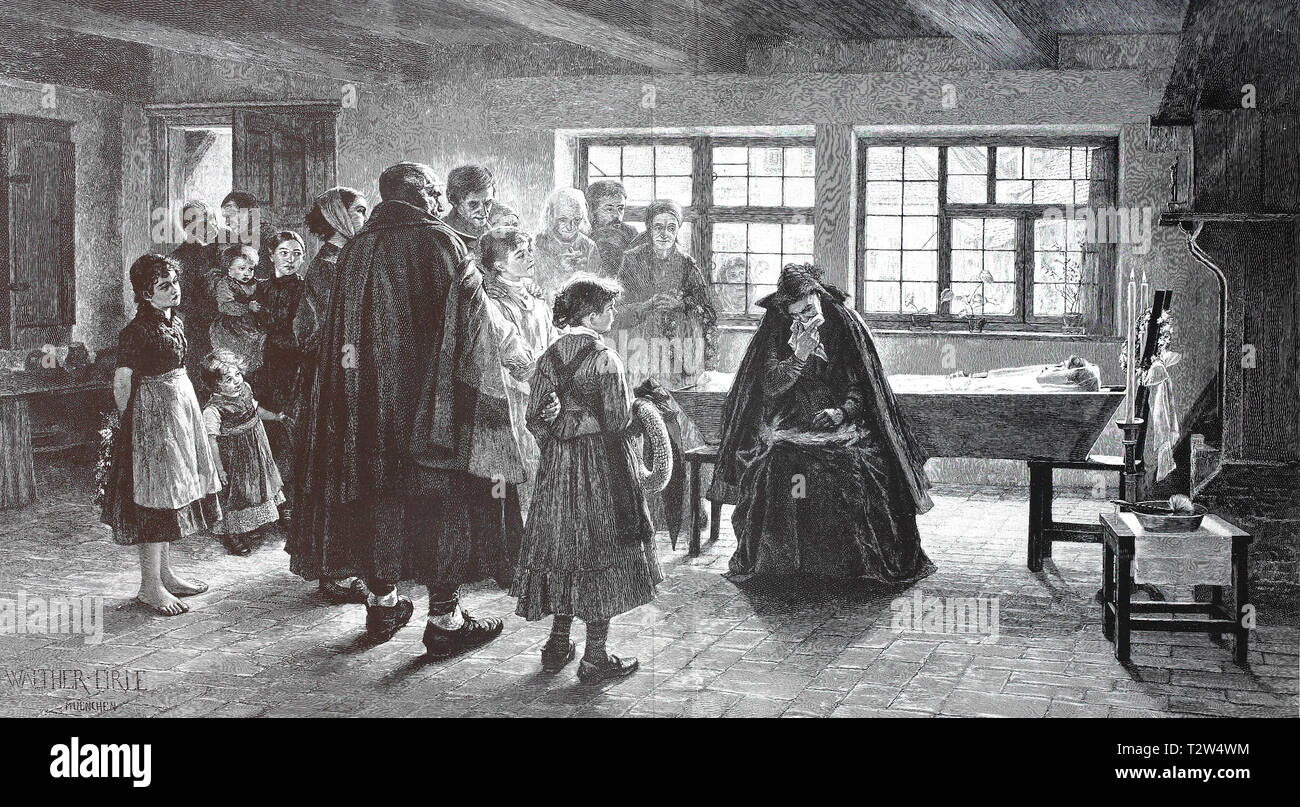 In the funereal house. Late woman is laid out in the open coffin and the mourning family says goodbye, Im Trauerhaus. Verstorbene Frau ist im offenen Sarg aufgebahrt und die trauernde Familie nimmt Abschied Stock Photo