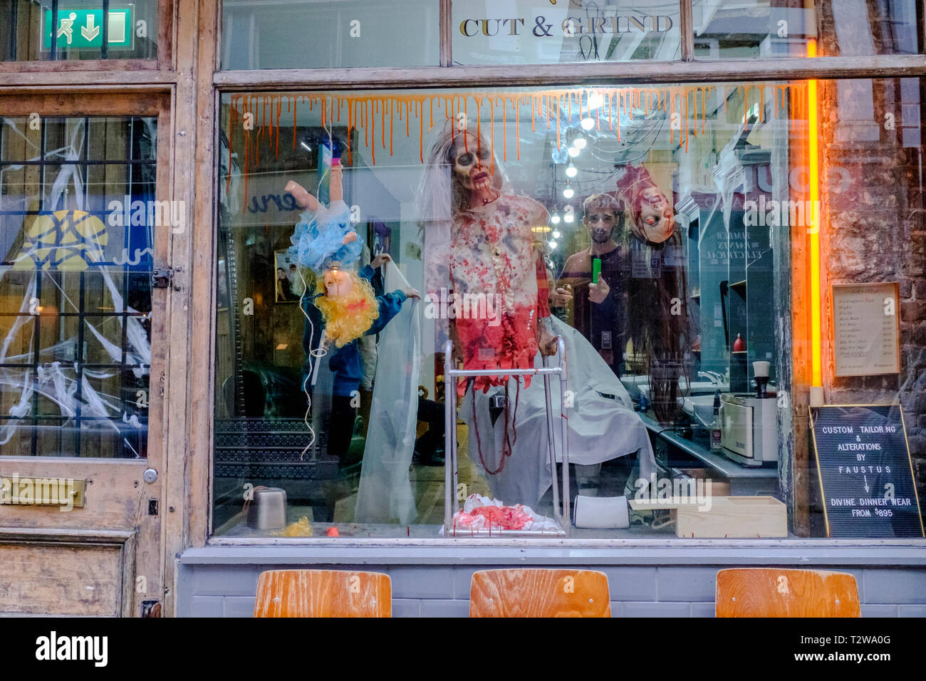 Barber shop gory halloween window display Stock Photo Alamy