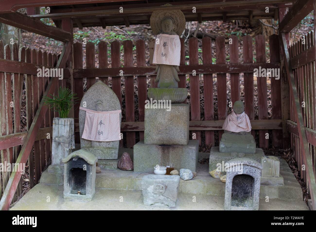 Jizo statues in a mini shrine in Nara, Japan Stock Photo Alamy