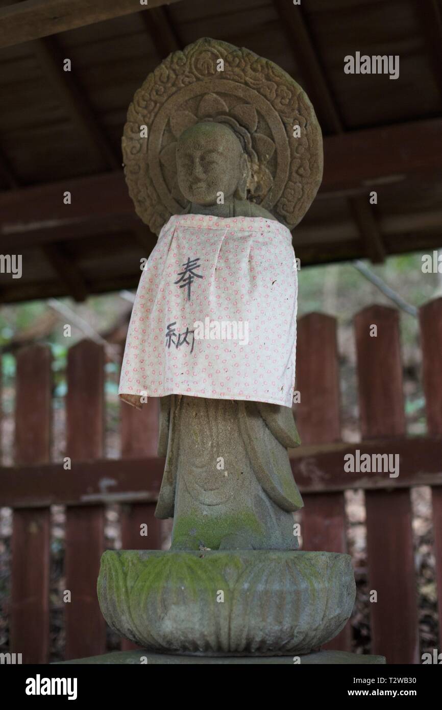 Jizo statue in a mini shrine in Nara, Japan Stock Photo Alamy