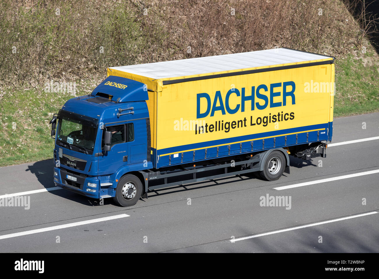 Dachser truck on motorway. Dachser is a German logistics company, founded by Thomas Dachser in 1930, with its headquarters in Kempten in the Allgäu re Stock Photo