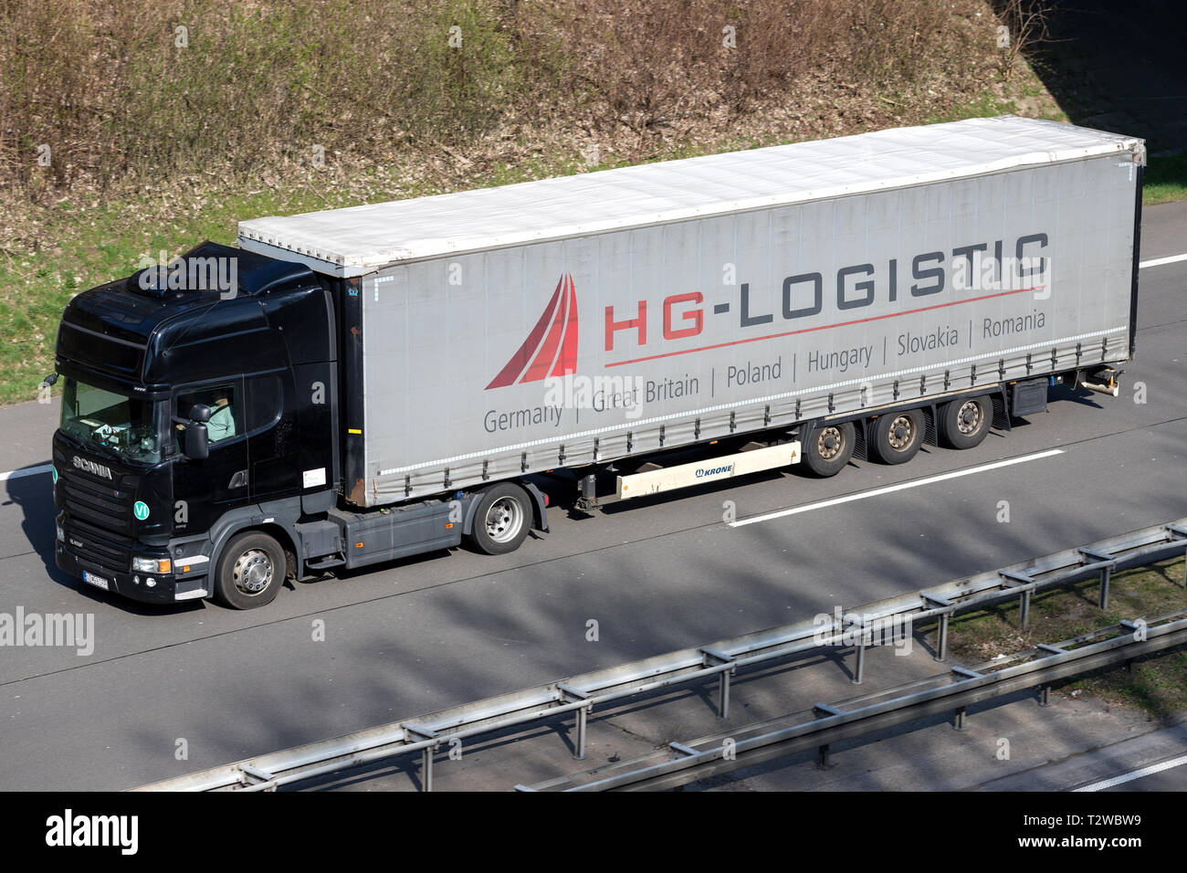 HG Logistic truck on motorway. Hämmerling Group Logistic GmbH is a medium-sized forwarding agency with approx. 350 employees. Stock Photo