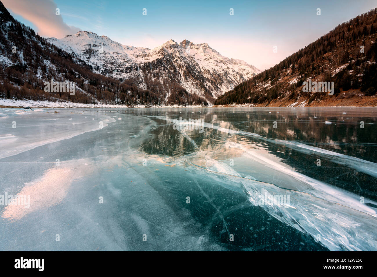 Ice at Pian Palù lake at dawn in Trentino Alto Adige. Italy, Europe Stock Photo