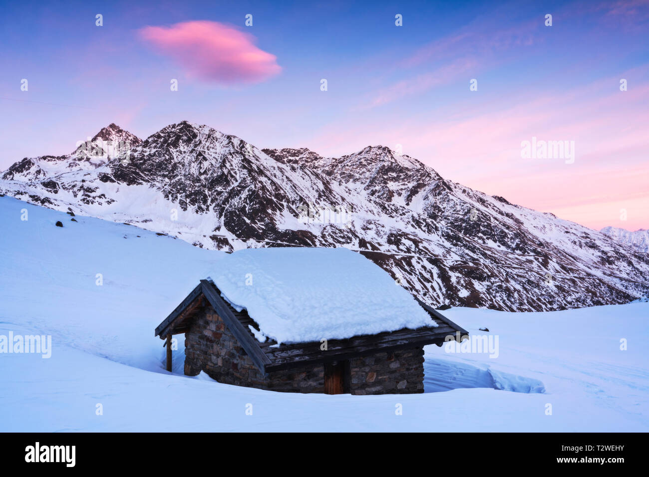 Linge refuge in Vallecamonica at sunset, Messi valley in Stelvio National park, Brescia province, Lombardy district, Italy, Europe. Stock Photo