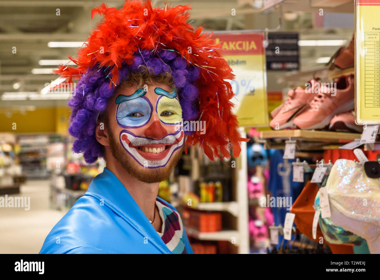 04.04.2019. RIGA, LATVIA. Clown at Maxima shop, before opening  in Akropole shopping centre. Official opening of biggest shopping centre Akropole in L Stock Photo