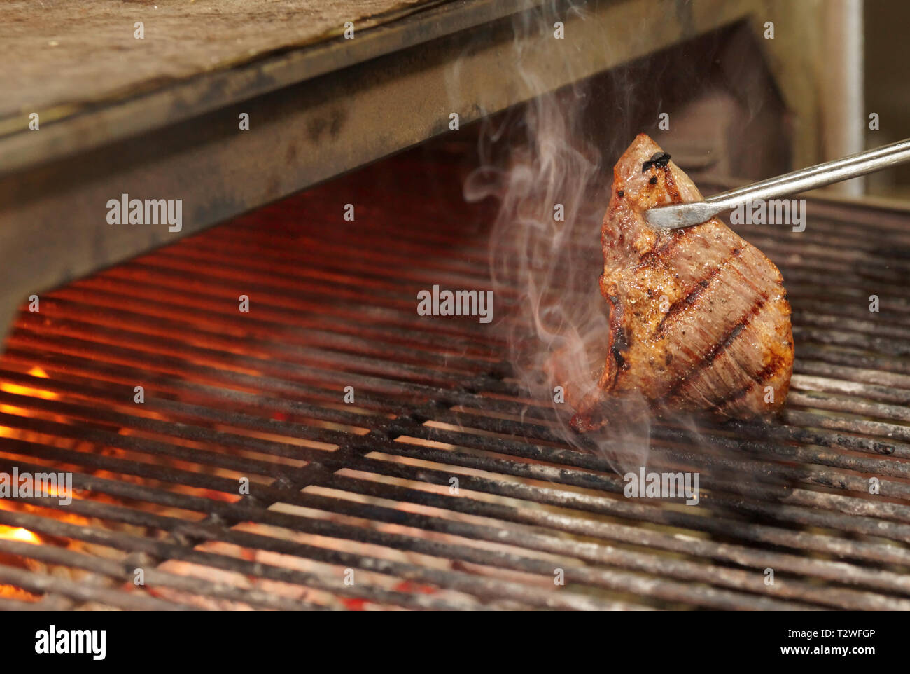 Beef diaphragm skirt steak being fried on grill Stock Photo Alamy