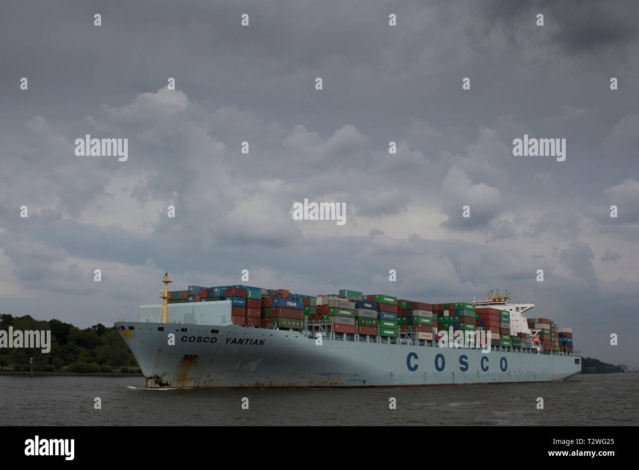 Cosco container ship on the Elbe in Hamburg Germany. Stock Photo