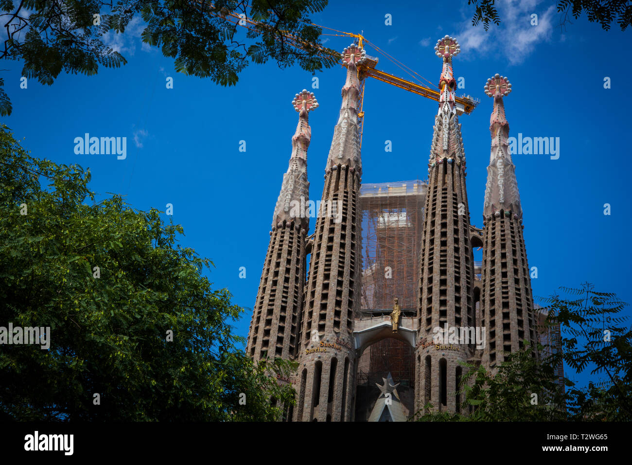 Mosaic Spires of Gaudi's Catherdral or Basilica La Sagrada Familia Stock Photo