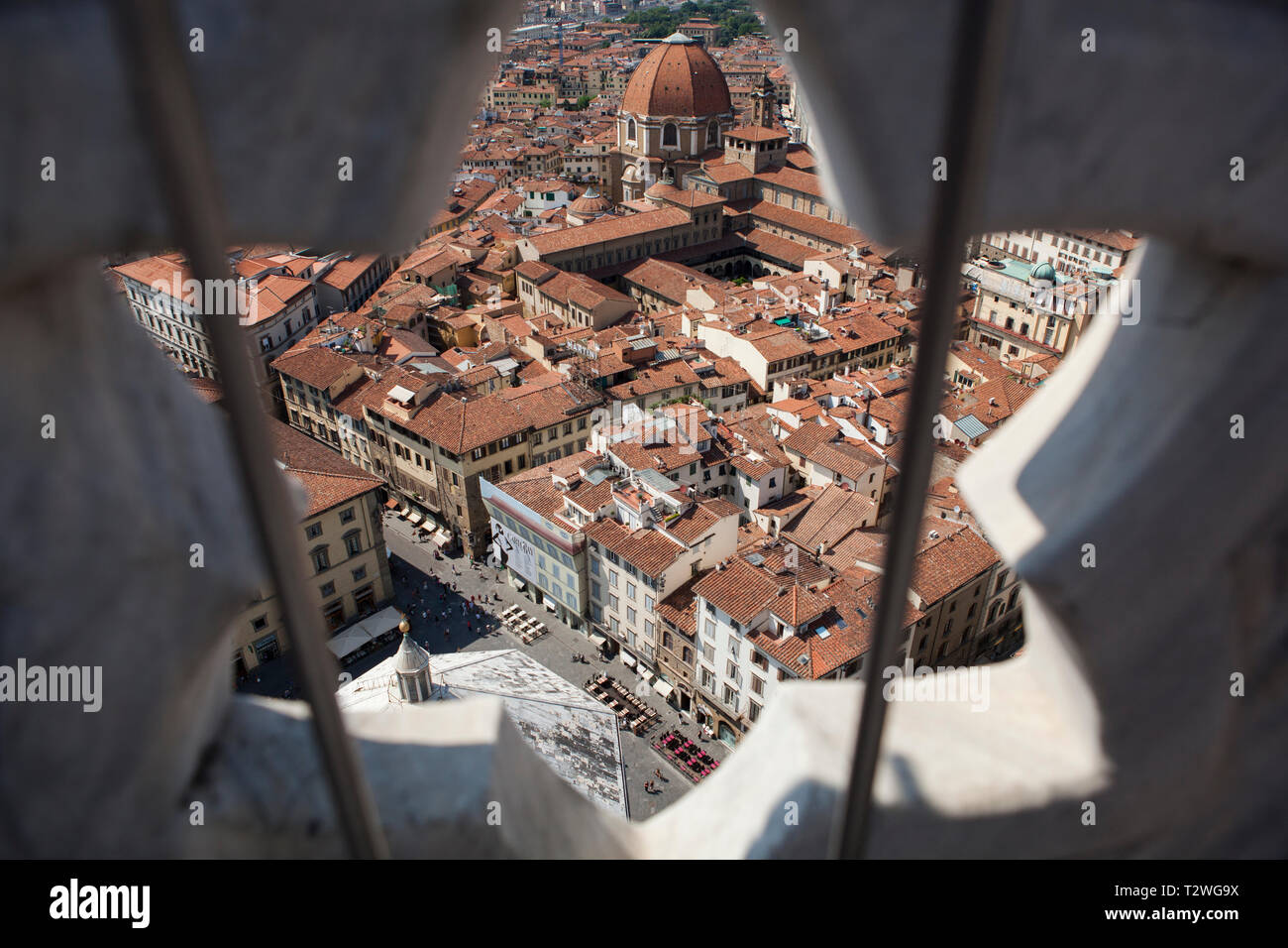 Florence Italy from above framed through the railing of the cathedral tower. Stock Photo