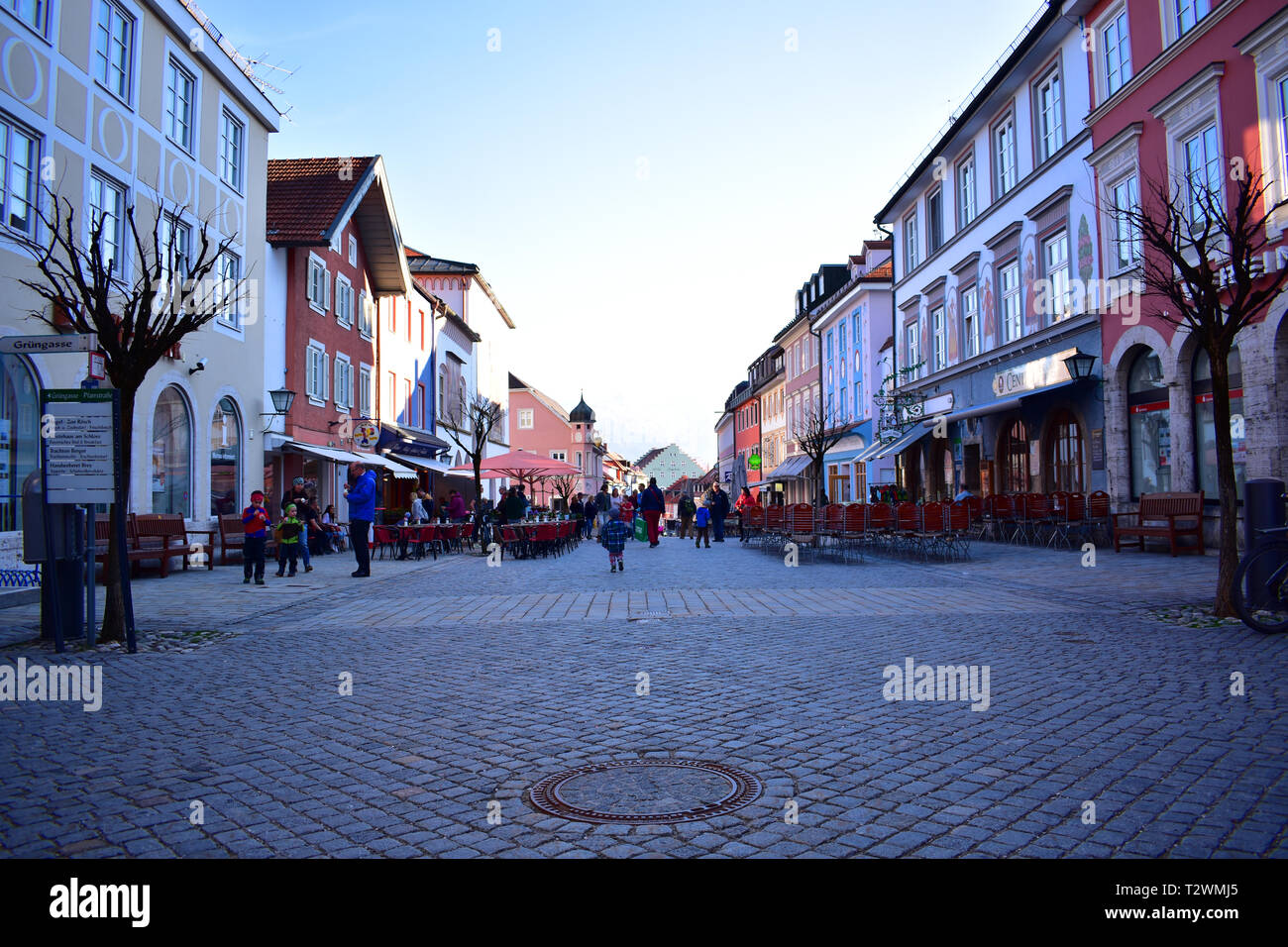 Pedestrian area in the bavarian town Murnau with the Alps in the backround. Stock Photo