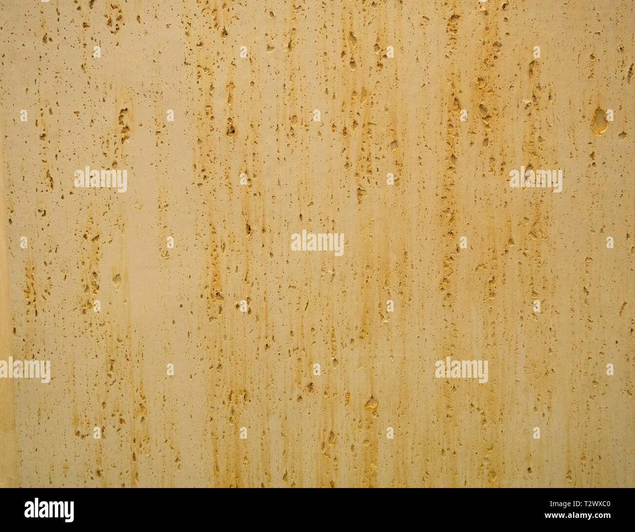 rusty metallic or concrete surface with ginger smudges for backdrop, background wallpaper texture Stock Photo