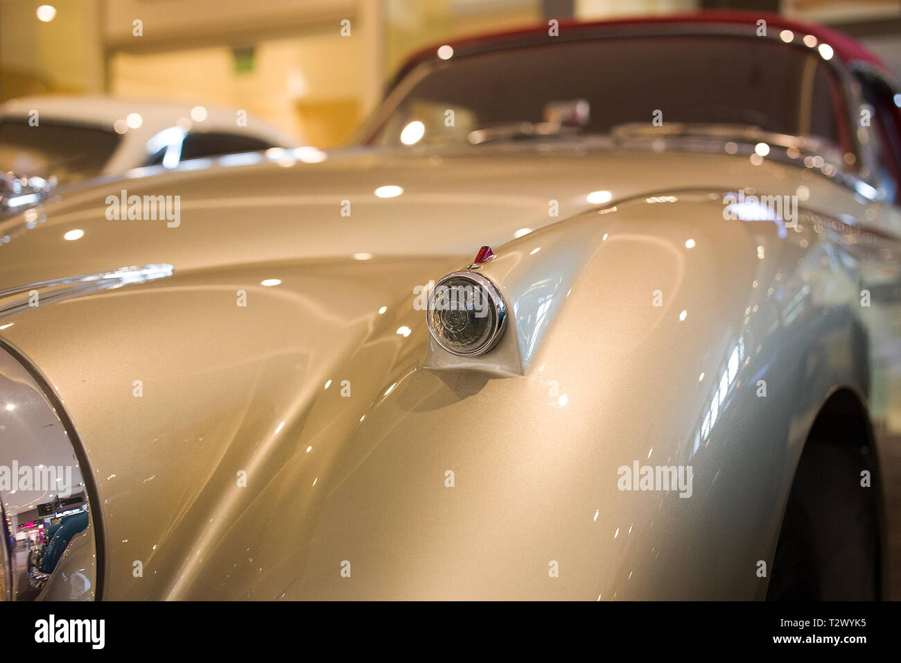 Concept of a classic convertible Jaguar car with right indicator in a ...