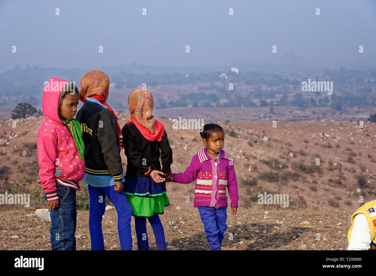 Indian children hanging out in a rural hilltop fair. Stock Photo