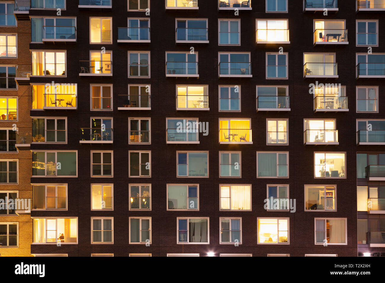 Modern apartment block at night Stock Photo Alamy