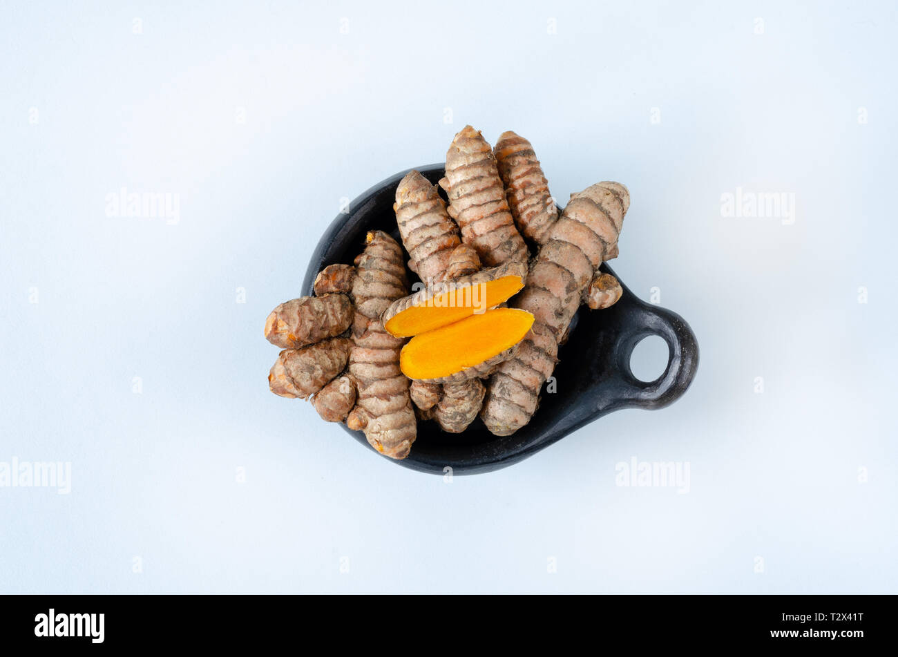 Turmeric on white background. Stock Photo