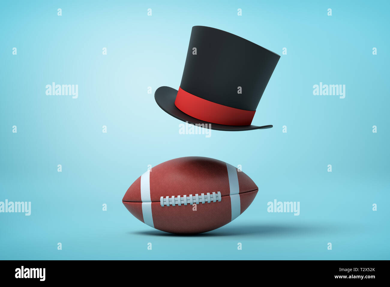 3d rendering of a brown gridiron football and a black tophat floating in air above the ball on light blue background. Sport leadership. Best player. S Stock Photo