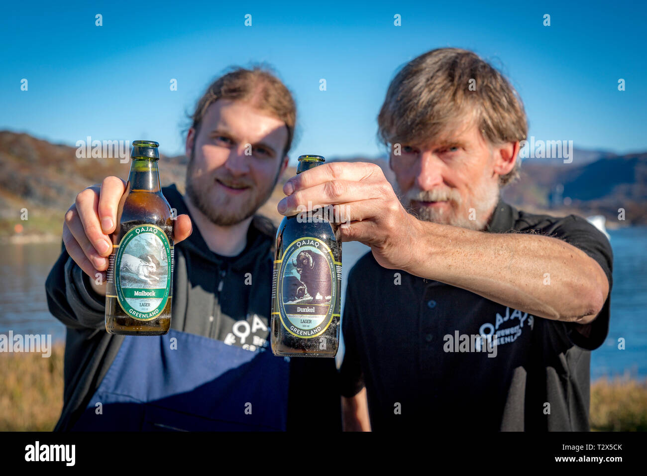 Holding a lager beer, Qajaq, Qajaq brewery, Narsaq, Greenland Stock Photo