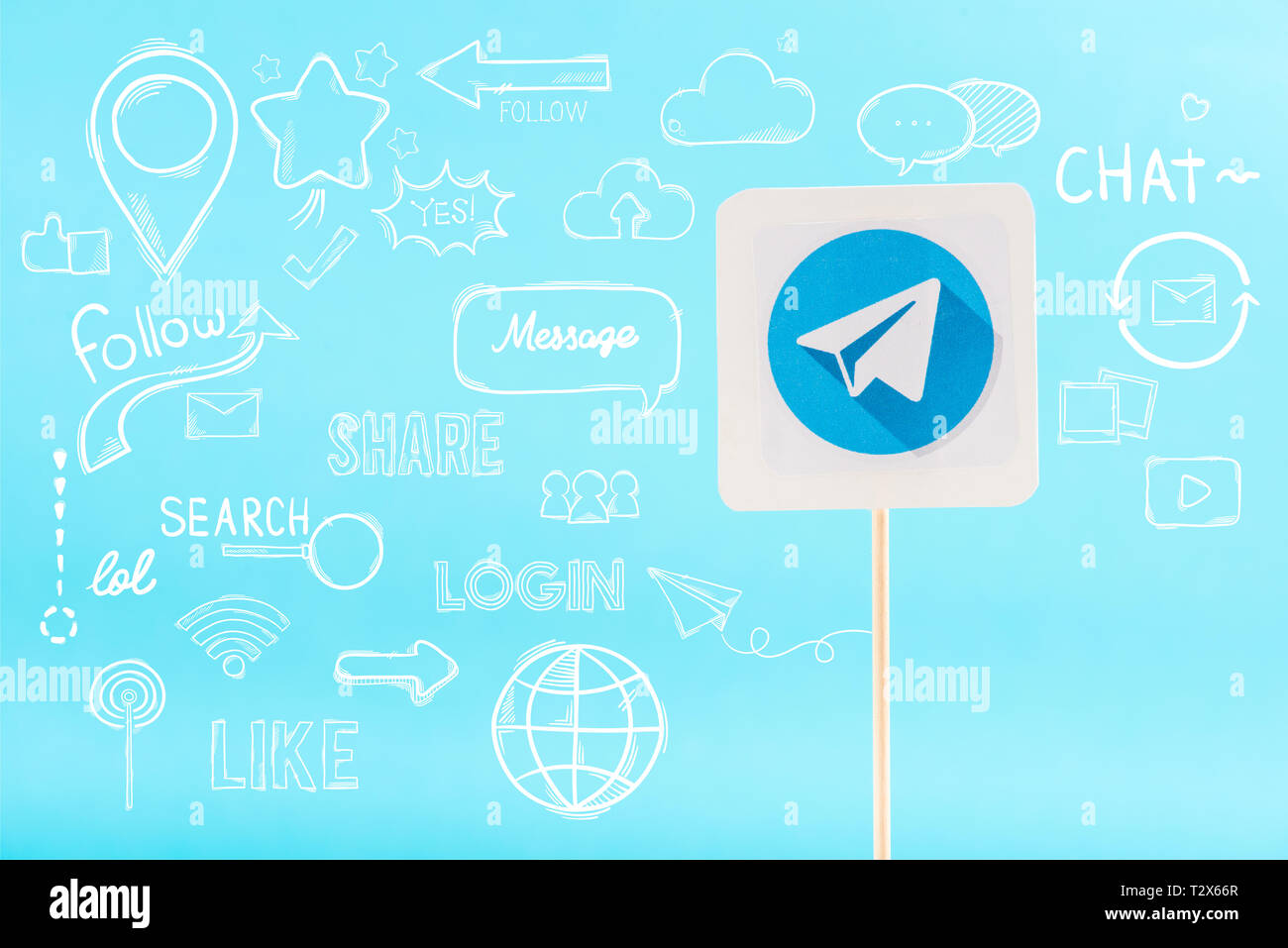 card with telegram logo and social media icons isolated on blue Stock ...