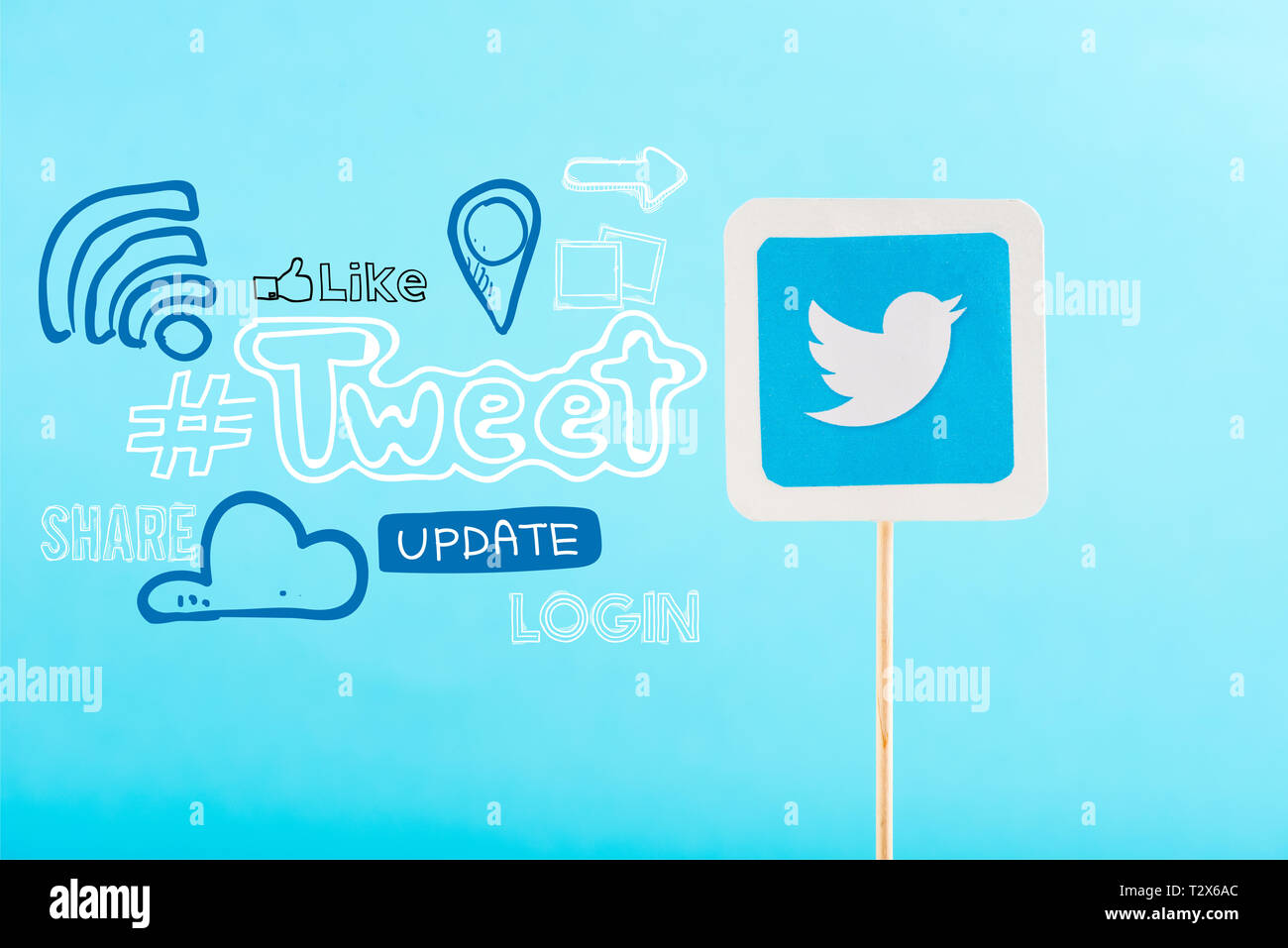 card with twitter logo and social media icons isolated on blue Stock ...