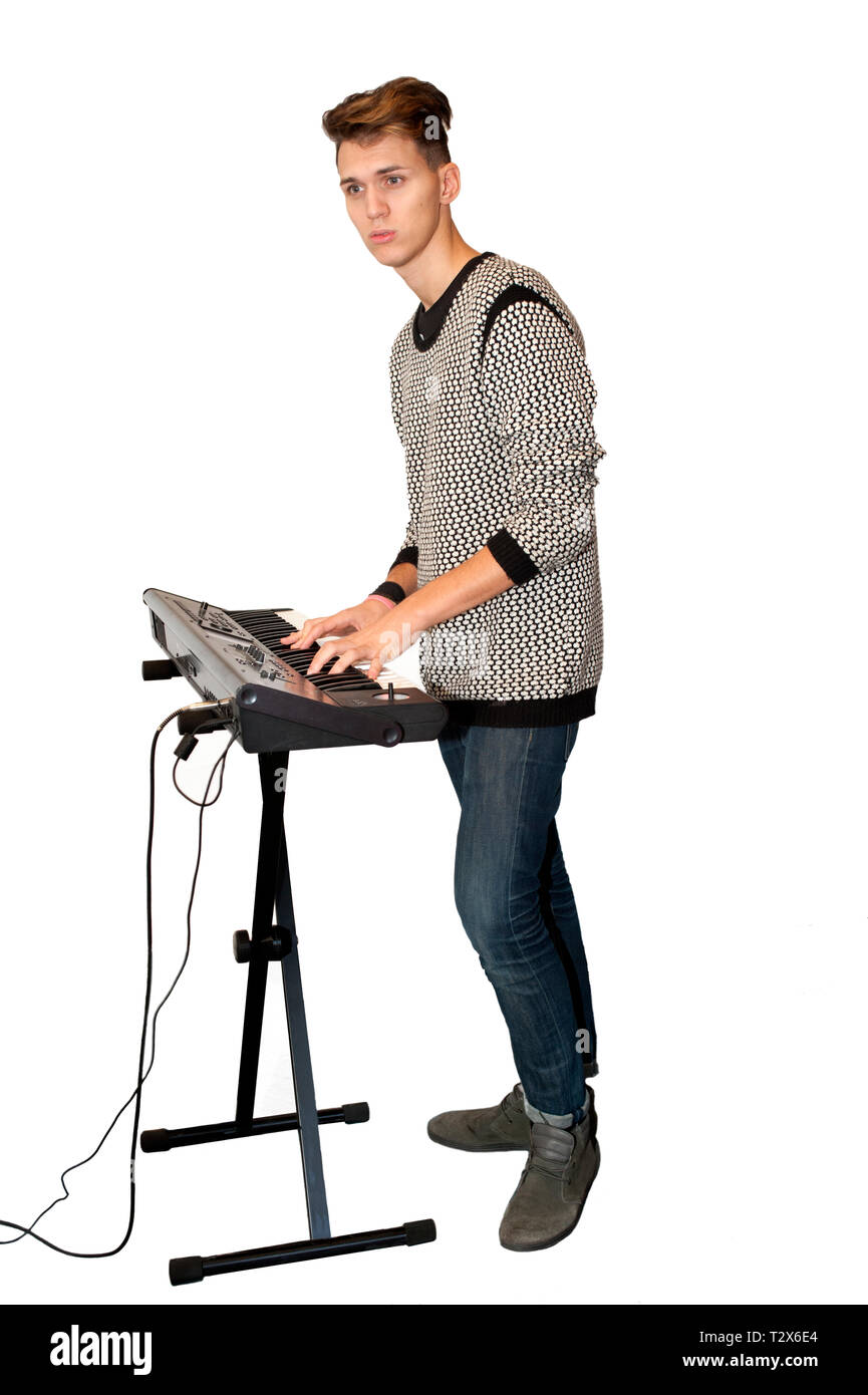 plays the electronic keyboard Stock Photo