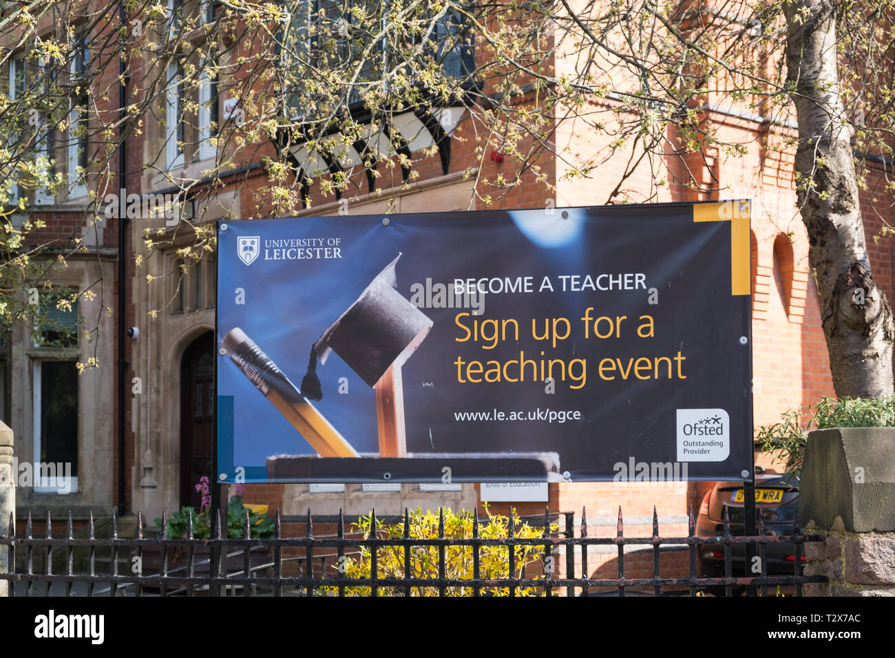 Large sign outside University of Leicester recruiting for teaching courses Stock Photo